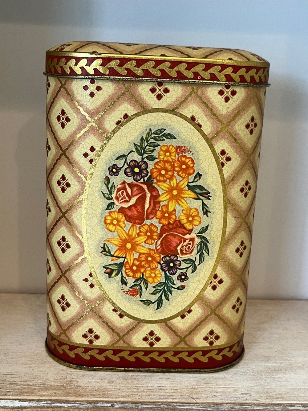 Vintage 1970’s Tin by Daher Long Island. Floral motif w/ a diamond pattern.